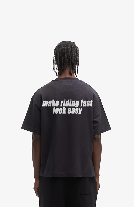 make riding fast look easy Oversized Shirt